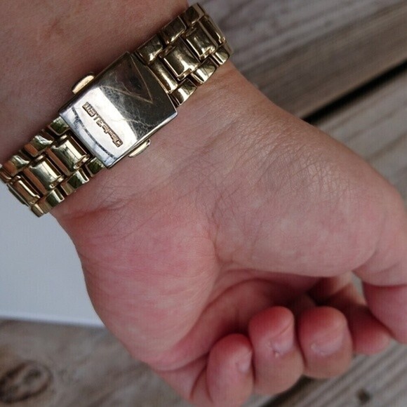 Guess Analog gold tone with rhinestones Watch main image 9